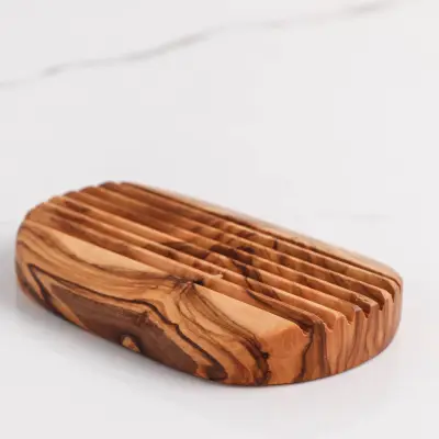 olive wood oval shape soap holder with parallel grooves