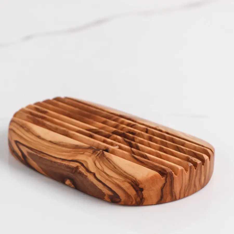 olive wood oval shape soap holder with parallel grooves