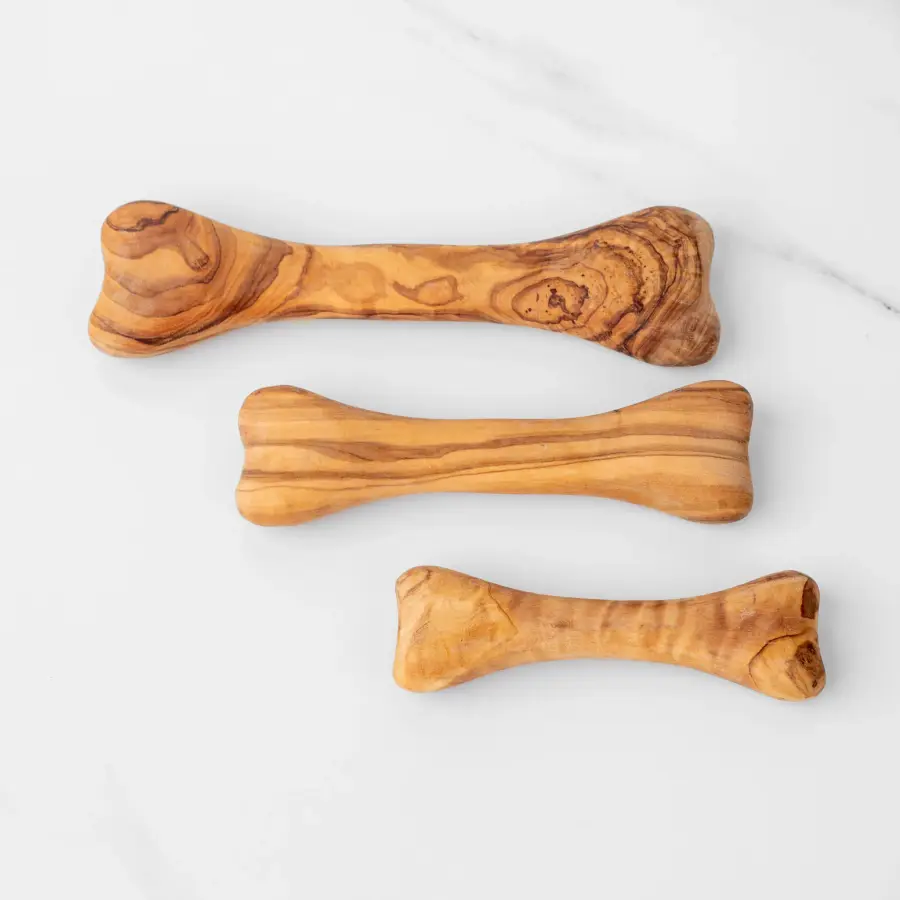 olive wood dog chewing bone