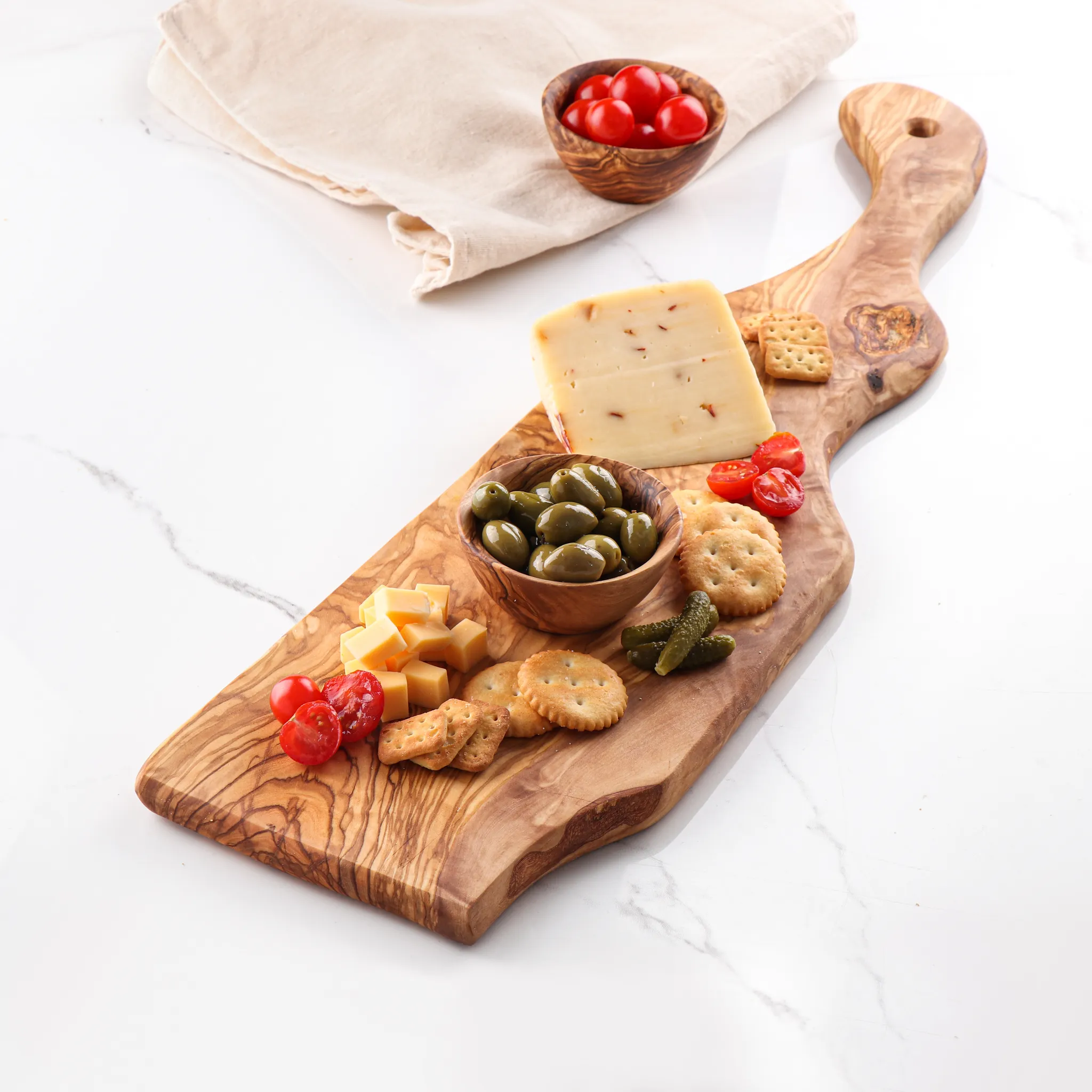 olive wood irregular shape cutting board with handle